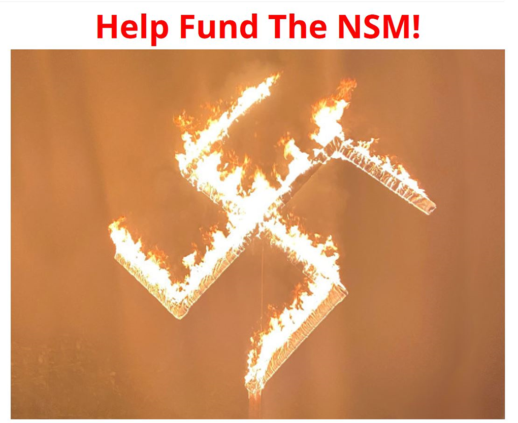 The National Socialist Movement solicits cryptocurrency donations with a swastika embedded in their appeal.  Coinbase