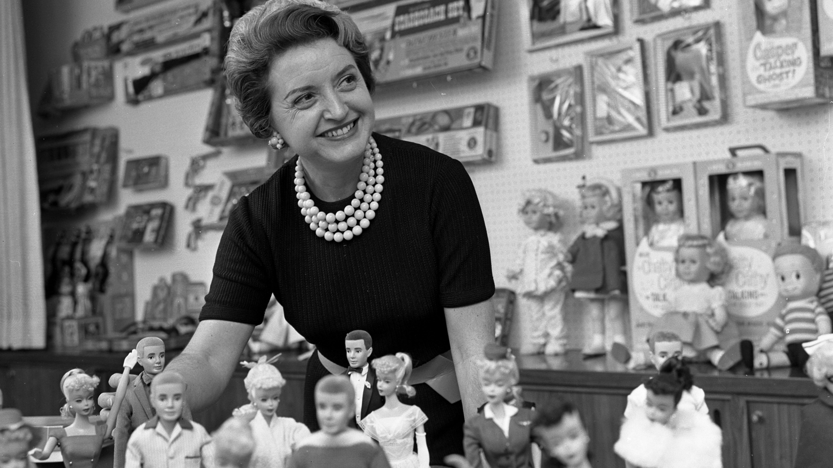 Ruth Handler Posing with Barbie Doll Collection