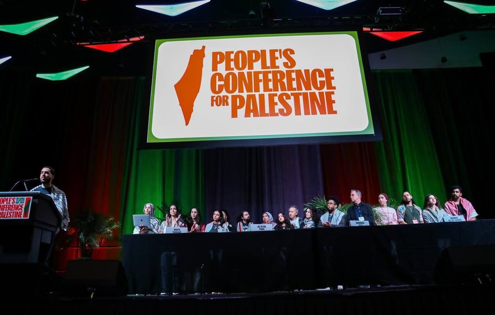 Speakers gather onstage for the final session of the “Peoples Conference for Palestine” on May 26, 2024. 