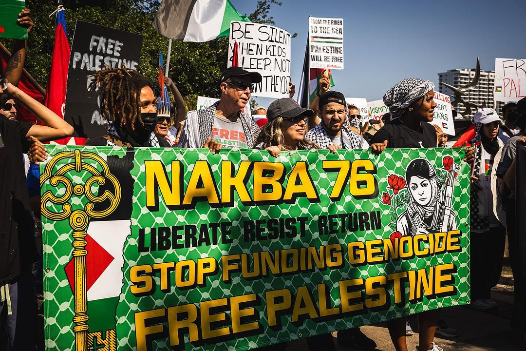 Anti-Israel protesters display a banner depicting Popular Front for the Liberation of Palestine (PFLP) convicted terrorist Leila Khaled at a Nakba Day event in Orlando, FL on May 11, 2024. (source: Instagram)