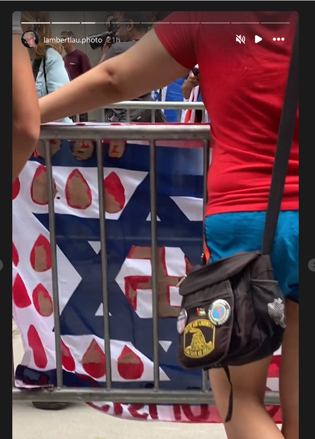 Anti-Israel protesters at Hillel at Baruch College in New York hold an Israeli flag with drops of blood, and a swastika in the middle of the star of David, June 5, 2024