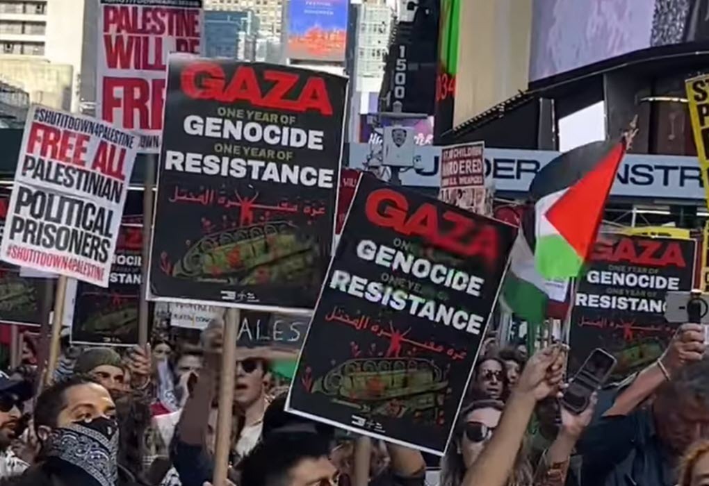 Anti-Israel protesters in New York, NY, on October 5, 2024, display signs featuring imagery from Hamas’s October 7, 2023, attack on Israel alongside the slogan “Gaza: One Year of Genocide, One Year of Resistance.” (source: Instagram)