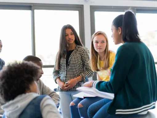 Multi-Ethnic Students Having a Discussion in a Classroom