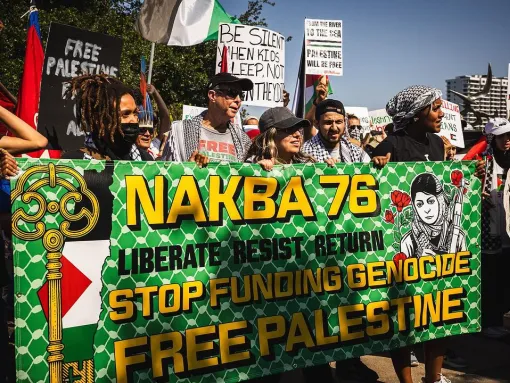 Anti-Israel protesters display a banner depicting Popular Front for the Liberation of Palestine (PFLP) convicted terrorist Leila Khaled at a Nakba Day event in Orlando, FL on May 11, 2024. (source: Instagram)