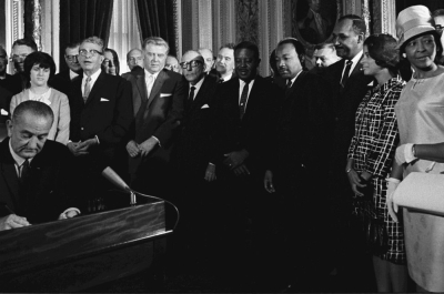 Lyndon B. Johnson Signs Voting Rights Act of 1965
